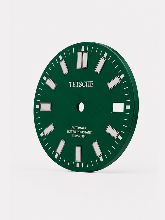 A bold, modern dial with a clean and highly legible design. The large applied hour markers create a strong presence, while the double index at 12 o’clock gives the dial a distinctive and balanced look.
Its versatile design makes it a natural choice for sporty, everyday watch builds.
Details
Green
28.5 mm diameter
Applied hour markers
Date window at 3 o’clock
Designed for automatic watch builds
