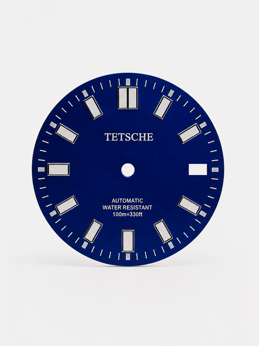 A bold, modern dial with a clean and highly legible design. The large applied hour markers create a strong presence, while the double index at 12 o’clock gives the dial a distinctive and balanced look.

Its versatile design makes it a natural choice for sporty, everyday watch builds.

Details

Blue
28.5 mm diameter
Applied hour markers
Date window at 3 o’clock
Designed for automatic watch builds
