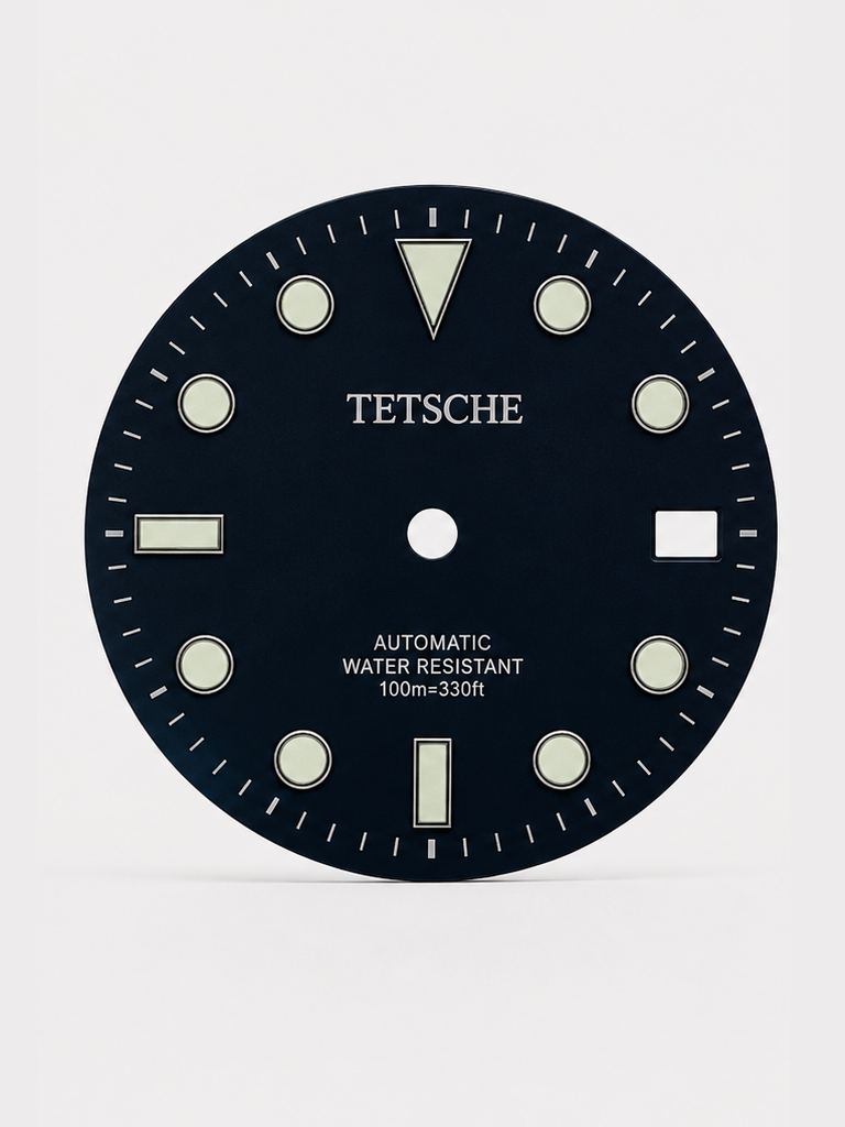 A classic Black dive-inspired dial with a clean, balanced design. The applied hour markers and bold 12 o’clock index provide excellent visual structure, while the subtle sunburst finish adds depth as the light moves across the dial.

Designed to work beautifully in both sporty and more understated builds.

Details

28.5 mm diameter
Applied hour markers
Date window at 3 o’clock
Sunburst finish
Designed for automatic watch builds