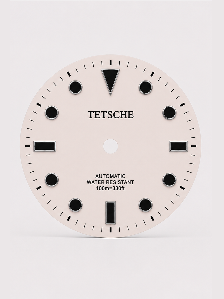 A classic white with black index dive-inspired dial with a clean, balanced design. The applied hour markers and bold 12 o’clock index provide excellent visual structure, while the subtle sunburst finish adds depth as the light moves across the dial.

Designed to work beautifully in both sporty and more understated builds.

Details

28.5 mm diameter
Applied hour markers
Date window at 3 o’clock
Sunburst finish
Designed for automatic watch builds