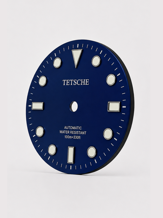 A classic Blue dive-inspired dial with a clean, balanced design. The applied hour markers and bold 12 o’clock index provide excellent visual structure, while the subtle sunburst finish adds depth as the light moves across the dial.

Designed to work beautifully in both sporty and more understated builds.

Details

28.5 mm diameter
Applied hour markers
Date window at 3 o’clock
Sunburst finish
Designed for automatic watch builds