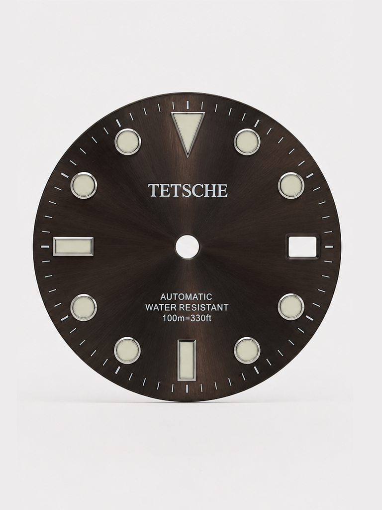 A classic Foggy Gray dive-inspired dial with a clean, balanced design. The applied hour markers and bold 12 o’clock index provide excellent visual structure, while the subtle sunburst finish adds depth as the light moves across the dial.

Designed to work beautifully in both sporty and more understated builds.

Details

28.5 mm diameter
Applied hour markers
Date window at 3 o’clock
Sunburst finish
Designed for automatic watch builds
