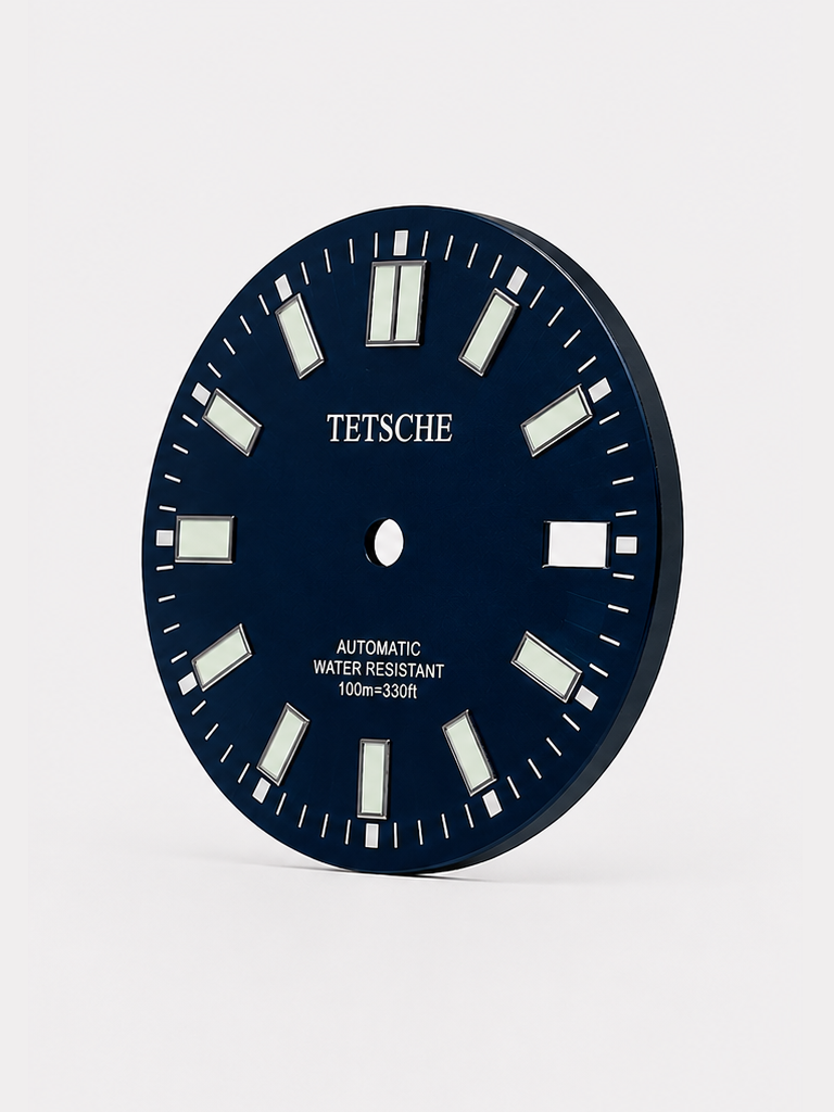 A bold, modern dial with a clean and highly legible design. The large applied hour markers create a strong presence, while the double index at 12 o’clock gives the dial a distinctive and balanced look.

Its versatile design makes it a natural choice for sporty, everyday watch builds.

Details

Dark Blue
28.5 mm diameter
Applied hour markers
Date window at 3 o’clock
Designed for automatic watch builds