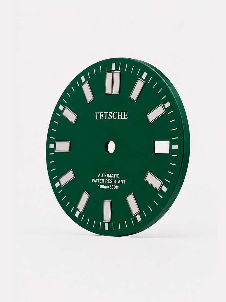 A bold, modern dial with a clean and highly legible design. The large applied hour markers create a strong presence, while the double index at 12 o’clock gives the dial a distinctive and balanced look.

Its versatile design makes it a natural choice for sporty, everyday watch builds.

Details

Green
28.5 mm diameter
Applied hour markers
Date window at 3 o’clock
Designed for automatic watch builds