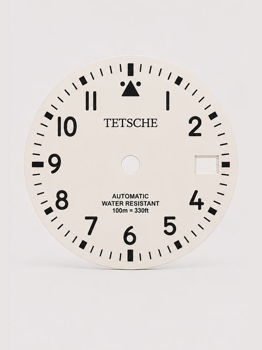 A clean field-inspired dial designed around maximum legibility and simplicity. The bold Arabic numerals, high-contrast minute track and distinctive 12 o’clock marker give the dial a functional, utilitarian character reminiscent of classic expedition and field watches.

A great choice for a rugged everyday build with a clean, understated look.

White
* 28.5 mm diameter
* Arabic numeral hour markers
* High-contrast minute track
* Date window at 3 o’clock
* Distinctive 12 o’clock marker
* Designed for a