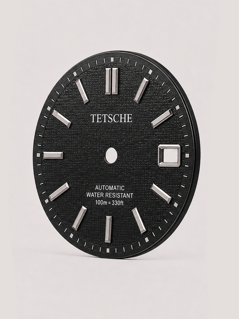 A distinctive vintage-inspired dial with a textured surface that gives every watch build a strong sense of character. The applied baton hour markers and contrasting outer minute track create a clean structure, while the textured finish brings depth and a subtle 1970s-inspired personality.

A great choice for a watch build that stands out without losing its classic feel.

Black
* 28.5 mm diameter
* Applied baton hour markers
* Textured dial finish
* Detailed outer minute track
* Date window at 3 o’clo