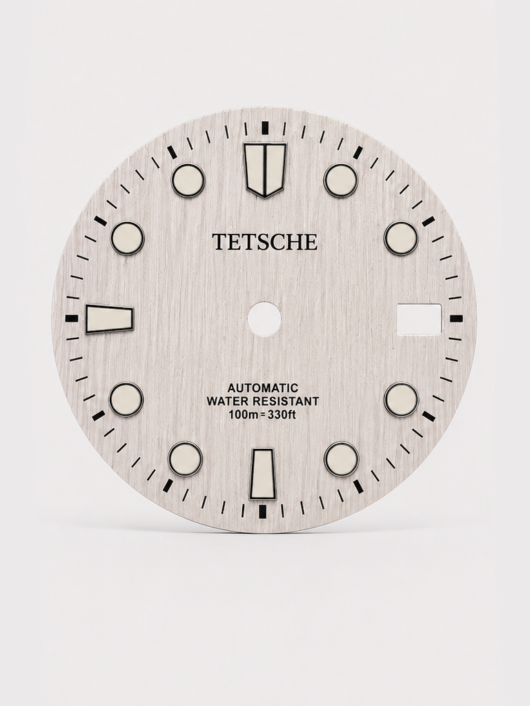 A bold vintage-inspired dial with a distinctive woodgrain-style texture that gives the surface a rich sense of depth and character. The applied hour markers provide a clean contrast against the deep green finish, combining classic dive-watch elements with a more unconventional retro look.

A great choice for a watch build with a natural, distinctive personality.

White
28.5 mm diameter
Applied hour markers
Woodgrain-style textured finish
Detailed outer minute track
Date window at 3 o’clock
Designed for a