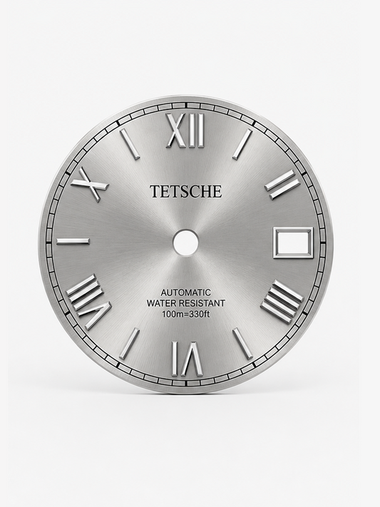 A refined dial inspired by classical Roman design. The applied Roman numerals create an elegant and distinctive character, while the clean black surface and silver-tone details give the dial a timeless, sophisticated appearance.

A perfect choice for a classic watch build with a more formal and elegant expression.

Details

Silver
28.5 mm diameter
Applied Roman numeral hour markers
Date window at 3 o’clock
Silver-tone details
Designed for automatic watch builds