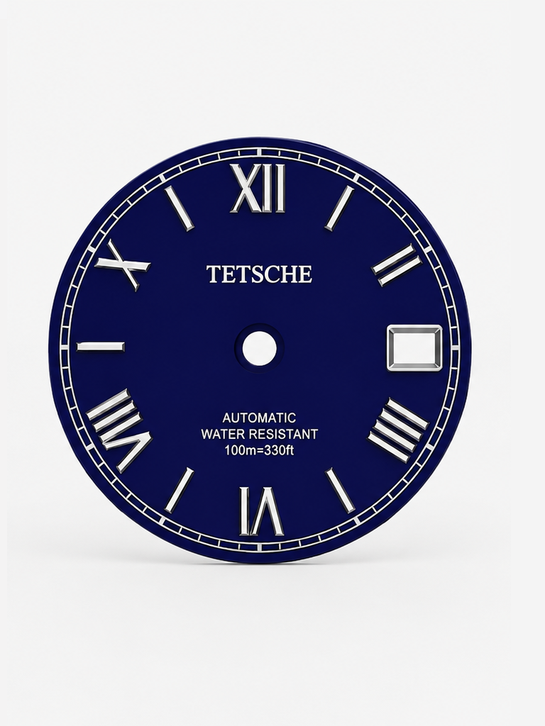 A refined dial inspired by classical Roman design. The applied Roman numerals create an elegant and distinctive character, while the clean black surface and silver-tone details give the dial a timeless, sophisticated appearance.

A perfect choice for a classic watch build with a more formal and elegant expression.

Details

Blue
28.5 mm diameter
Applied Roman numeral hour markers
Date window at 3 o’clock
Silver-tone details
Designed for automatic watch builds