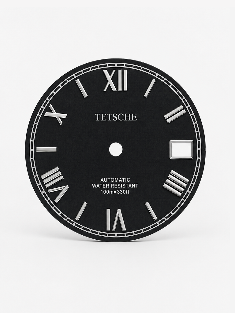 A refined dial inspired by classical Roman design. The applied Roman numerals create an elegant and distinctive character, while the clean black surface and silver-tone details give the dial a timeless, sophisticated appearance.

A perfect choice for a classic watch build with a more formal and elegant expression.

Details

Black
28.5 mm diameter
Applied Roman numeral hour markers
Date window at 3 o’clock
Silver-tone details
Designed for automatic watch builds